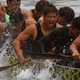 Image for article titled Add oil! The Dragon Boat Festival, in pictures
